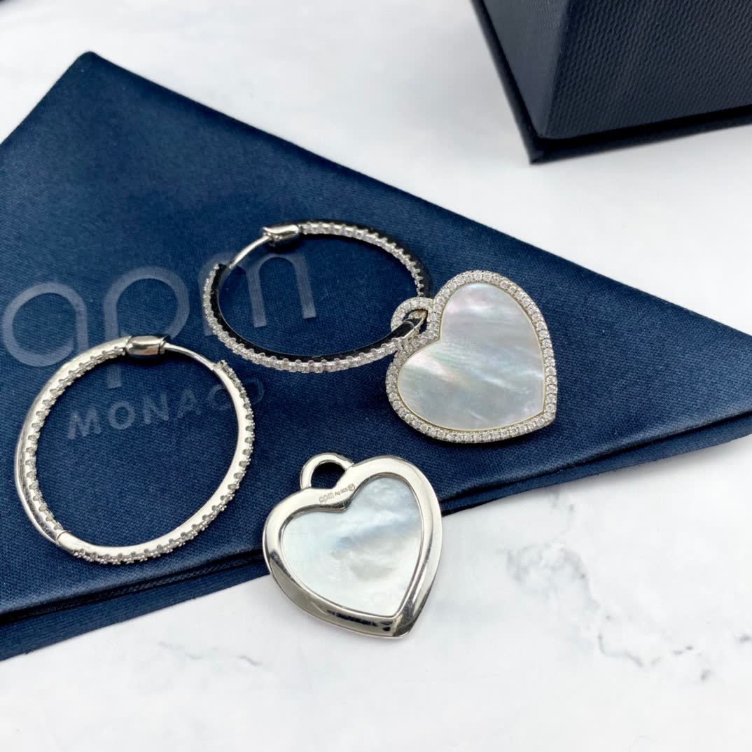 APM Monaco Elegant Heart-Shaped Hoop Earrings with Diamond Accents